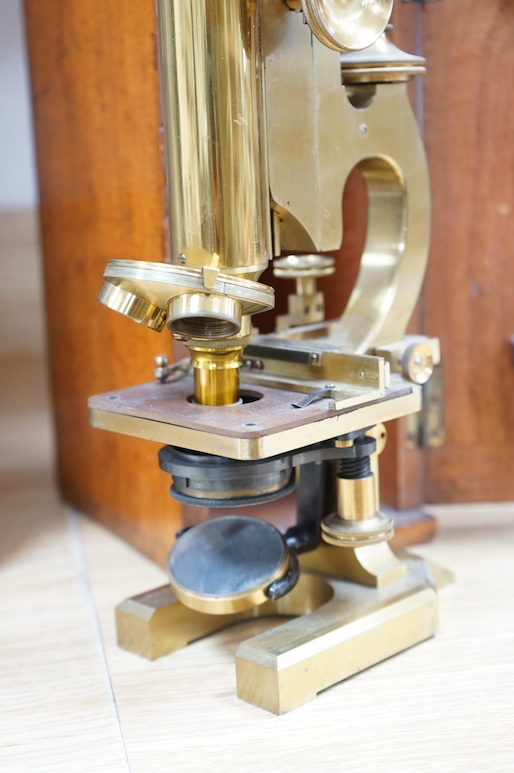 An R&J Beck London cased brass microscope, 31cm high. Condition - good